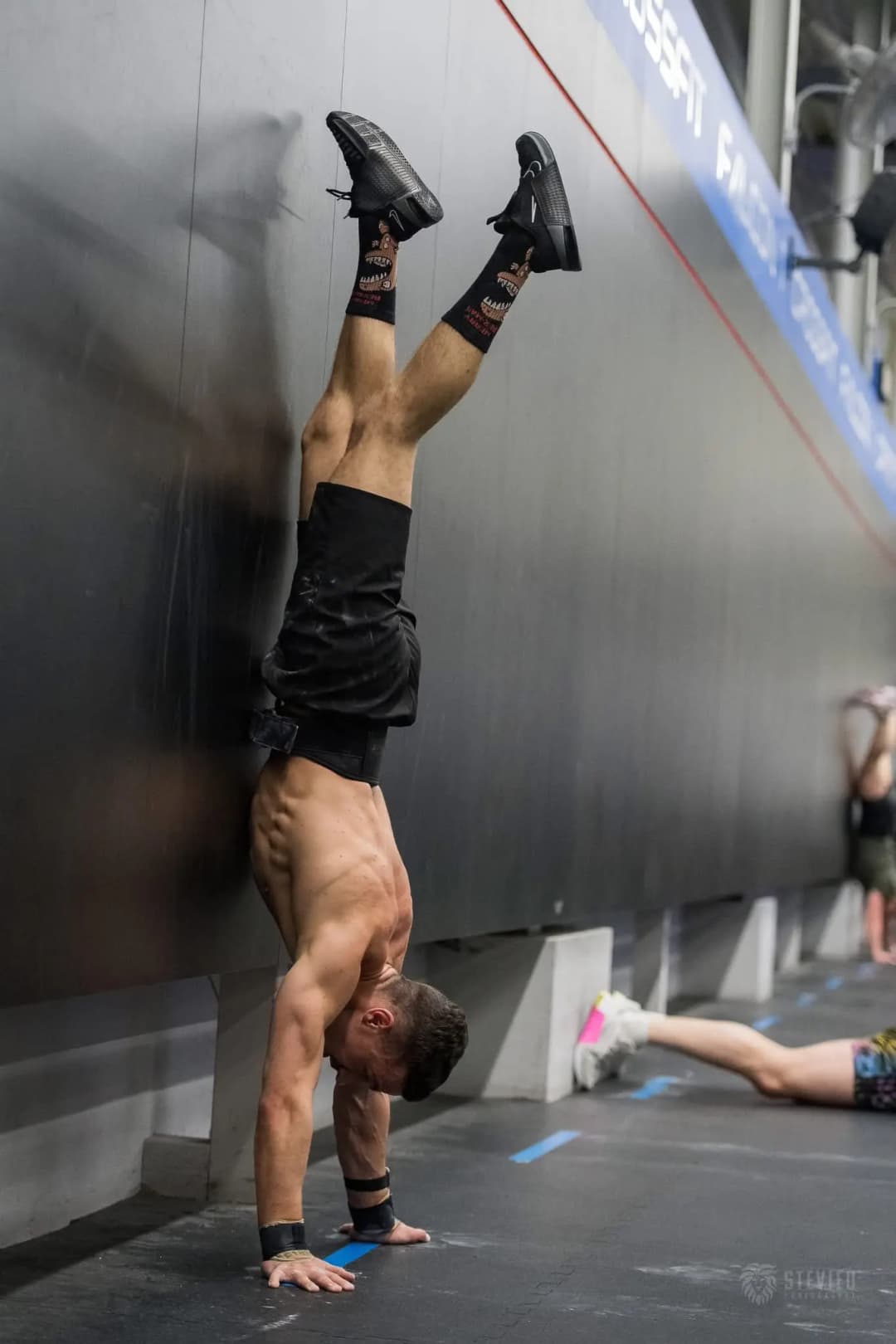 Athlete walking by hands